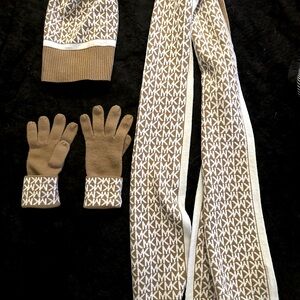 Michael kors mittens, scarf, and beanie.